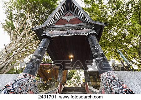 Entrance to King Sidabutar's Grave, Tomok village on Samosir Island, Lake Toba, North Sumatra, Indonesia View Large Photo Image Stock Image - Entrance to King Sidabutar's Grave, Tomok village on Samosir Island, Lake Toba, North Sumatra, Indonesia. Fotosearch