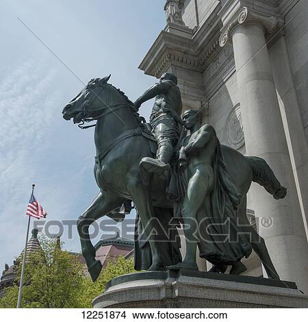 Picture - Equestrian statue and building with American flag; New York City, New York, United States of America. Fotosearch
