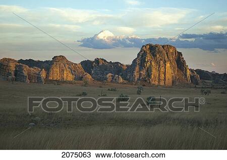 Stock Image - Eroded Jurassic Sandstone Massive By La Fenetre Rock Formation, Isalo National Park, Fianarantsoa Province, Madagascar. Fotosearch
