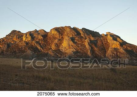 Stock Photography - Eroded Jurassic Sandstone Massive By La Fenetre Rock Formation, Isalo National Park, Fianarantsoa Province, Madagascar. Fotosearch
