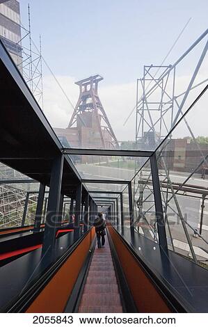 Stock Image - Escalator To The Visitors Centre Located In The Coal Washing Plant Of The Zollverein Coal Mine Industrial Complex, Essen, North Rhine-Westphalia, Germany. Fotosearch