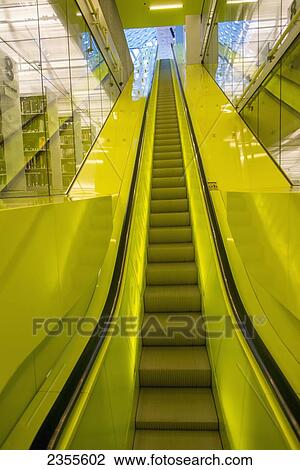Escalator With Bright Yellow Sides In Seattle Central Library; Seattle, Washington, United States Of America View Large Photo Image Stock Image - Escalator With Bright Yellow Sides In Seattle Central Library; Seattle, Washington, United States Of America. Fotosearch