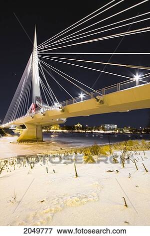 Esplanade Riel Bridge Crossing The Red River Connecting Downtown Winnipeg To St. Boniface, Winnipeg, Manitoba View Large Photo Image Stock Photo - Esplanade Riel Bridge Crossing The Red River Connecting Downtown Winnipeg To St. Boniface, Winnipeg, Manitoba. Fotosearch