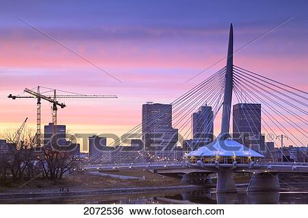 Esplanade Riel Bridge, Skyline And Construction Site Of Canadian Museum For Human Rights At Dusk, Winnipeg, Manitoba View Large Photo Image Stock Photograph - Esplanade Riel Bridge, Skyline And Construction Site Of Canadian Museum For Human Rights At Dusk, Winnipeg, Manitoba. Fotosearch