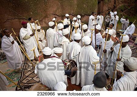 Ethiopia, Ethiopian Orthodox deacons wearing Shamma tunic in the courtyard of A View Large Photo Image Stock Photograph - Ethiopia, Ethiopian Orthodox deacons wearing Shamma tunic in the courtyard of A. Fotosearch