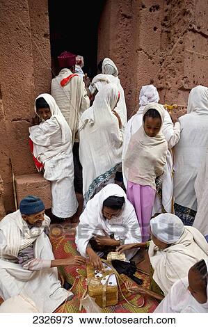 Ethiopia, Ethiopian Orthodox pilgrims making money offerings in the courtyard of A View Large Photo Image Stock Image - Ethiopia, Ethiopian Orthodox pilgrims making money offerings in the courtyard of A. Fotosearch
