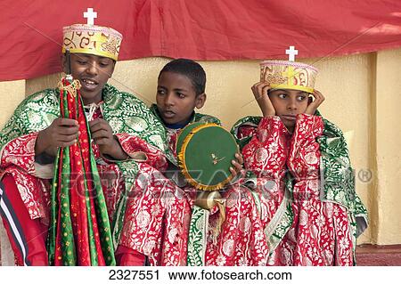 Stock Image - Ethiopia, Gondar Region, Young boys wearing traditional clothing for annual Christian Timkat Festival; Gondar. Fotosearch