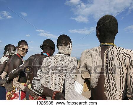 Stock Photo - Ethiopia, Nyangatom Painted Warriors; Omo Valley. Fotosearch