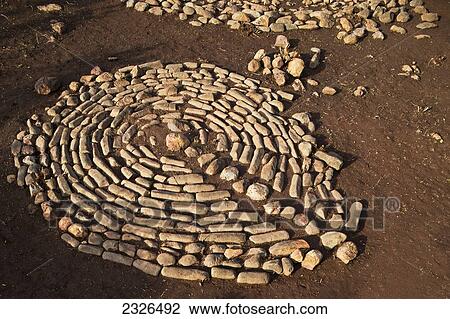 Stock Image - Ethiopia, South Western Ethiopia, Omo Valley, Southern Mursiland, Centre of benna kulugto (Stone Platform); Dirikoro. Fotosearch