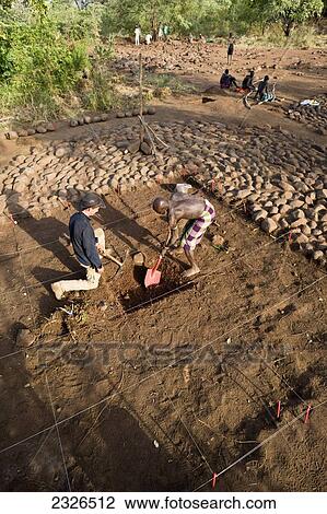 Stock Image - Ethiopia, South Western Ethiopia, Omo Valley, Southern Mursiland, Archeology work; Dirikoro. Fotosearch