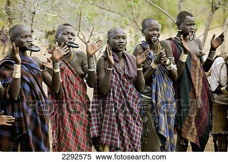 Stock Photography - Ethiopia, Southern Nations Nationalities And Peoples' Region, South Omo, Southern Mursiland, Group Of Mursi Tribal Women During Festival; Dirikoro. Fotosearch