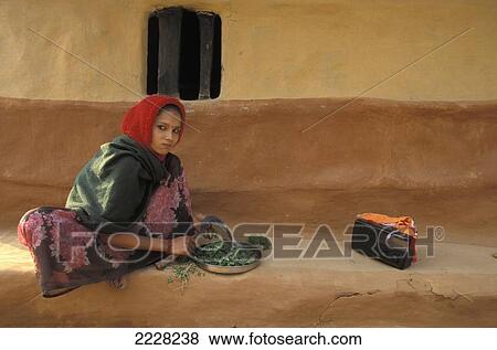 Stock Photo - Ethiopia, Woman Working; Addis Ababa. Fotosearch