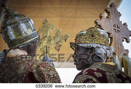 Stock Photograph - Ethiopian Orthodox Christian priests; Lalibela, Ethiopia. Fotosearch