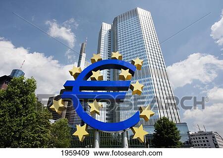 Euro Monument In Front Of The Eurotower, Headquarters Of The European Central Bank In Frankfurt Am Main, Germany View Large Photo Image Stock Photo - Euro Monument In Front Of The Eurotower, Headquarters Of The European Central Bank In Frankfurt Am Main, Germany. Fotosearch
