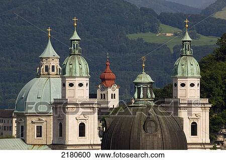 Stock Image - Europe, Austria, Saltzburg, Church Spires Towers. Fotosearch