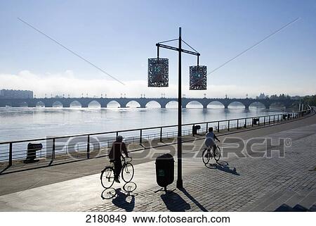 Stock Photo - Europe, France, Bordeaux, riverside gironde cyclist. Fotosearch