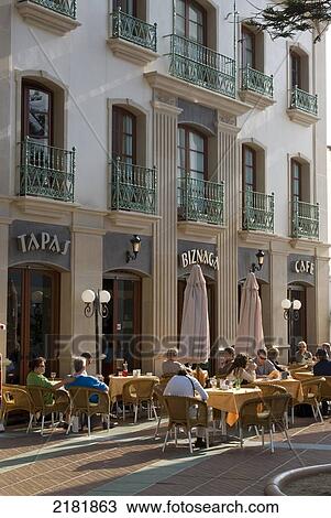 Stock Image - Europe, Spain, Andalucia, Costa Del Sol, Nerja, Cafe Outdoors. Fotosearch