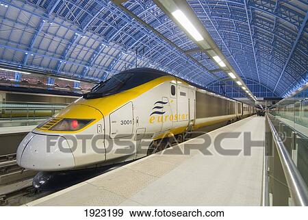 Eurostar Train In St Pancras Station At Dusk, London, England View Large Photo Image Stock Photo - Eurostar Train In St Pancras Station At Dusk, London, England. Fotosearch