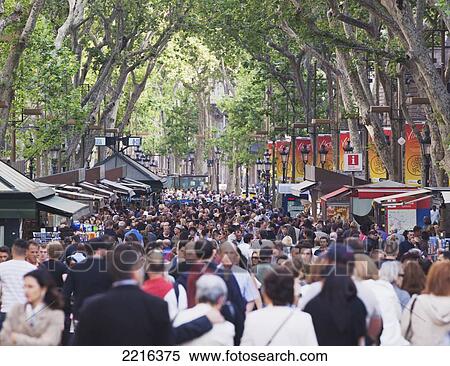 Stock Photography - Evening Crowds Strolling On La Rambla; Barcelona Spain. Fotosearch