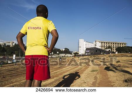 Picture - Every day budding athletes train in the amphitheatre in Meskel square in central Addis Ababa; Addis Ababa, Ethiopia. Fotosearch