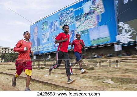 Stock Photo - Every day budding athletes train in the amphitheatre in Meskel square in central Addis Ababa; Addis Ababa, Ethiopia. Fotosearch