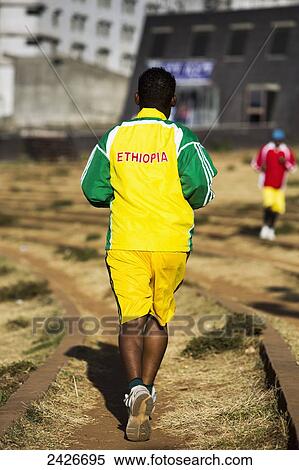 Stock Photography - Every day budding athletes train in the amphitheatre in Meskel square in central Addis Ababa; Addis Ababa, Ethiopia. Fotosearch