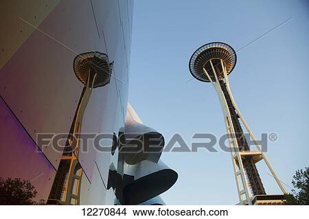 Experience Music Project (EMP) building, designed by Frank Gehry and Space Needle at Seattle Center, Seattle, Washington, United States View Large Photo Image Picture - Experience Music Project (EMP) building, designed by Frank Gehry and Space Needle at Seattle Center, Seattle, Washington, United States. Fotosearch