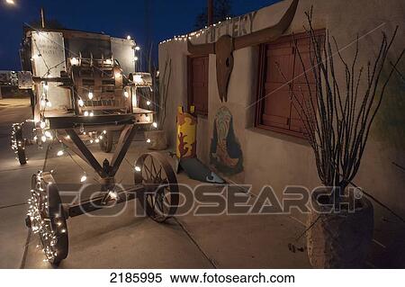 Stock Photography - Exterior Of Pottery Shop At Night, Alpine, Texas, Usa. Fotosearch
