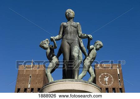 Exterior Of The Oslo City Hall With A Statue Of A Woman Holding Hands With Children View Large Photo Image Stock Photograph - Exterior Of The Oslo City Hall With A Statue Of A Woman Holding Hands With Children. Fotosearch