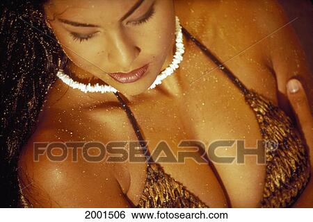 Stock Photograph - Extreme Close-Up Sexy Local Woman Wearing Bikini Top And Necklace, Eyes Closed. Fotosearch