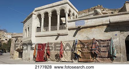 Stock Photo - Fabric Hanging On Display Outside A Building; Mustafapasa Nevsehir Turkey. Fotosearch