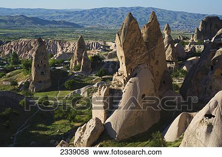 Stock Photo - Fairy Chimneys Houses In Uchisar; Turkey. Fotosearch