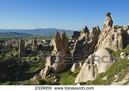Stock Photo - Fairy Chimneys Houses In Uchisar; Turkey. Fotosearch