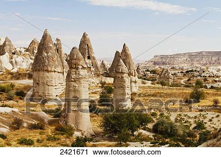 Stock Image - Fairy chimneys in Pigeon Valley; Cappadocia, Turkey. Fotosearch