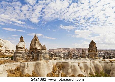 Fairy chimneys in Pigeon Valley; Cappadocia, Turkey View Large Photo Image Stock Image - Fairy chimneys in Pigeon Valley; Cappadocia, Turkey. Fotosearch