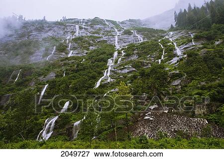 Stock Photo - Falls Close To Yellowhead Highway, Road 16 Near Prince Rupert, British Columbia. Fotosearch