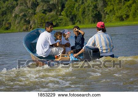 Family Boating In Tortuguero Canal, Costa Rica View Large Photo Image Stock Photo - Family Boating In Tortuguero Canal, Costa Rica. Fotosearch