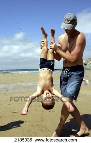 Family/ Kids On Beach Chris Martin/ Axiom View Large Photo Image Stock Photograph - Family/ Kids On Beach Chris Martin/ Axiom. Fotosearch