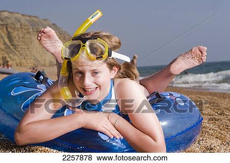 Stock Photo - Family On Beach, England, UK. Fotosearch