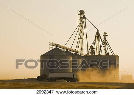 Stock Photo - Farm Truck With Grain Storage Facility; Somerset Manitoba Canada. Fotosearch