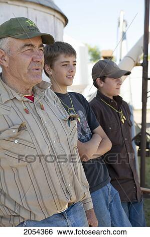 Farmer And His Grandsons. Munson Alberta View Large Photo Image Stock Photograph - Farmer And His Grandsons. Munson Alberta. Fotosearch