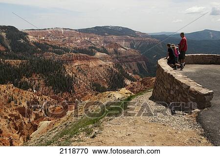 Stock Image - Father And Children Enjoying North View Of Canyon At Cedar Breaks National Monument; Brian Head Utah Usa. Fotosearch