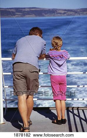 Stock Image - Father And Daughter On The Ferry From Kangaroo Island. Fotosearch