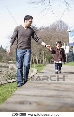 Father And Daughter Walk On Board Walk At Granville Island, Vancouver Bc View Large Photo Image Stock Photo - Father And Daughter Walk On Board Walk At Granville Island, Vancouver Bc. Fotosearch