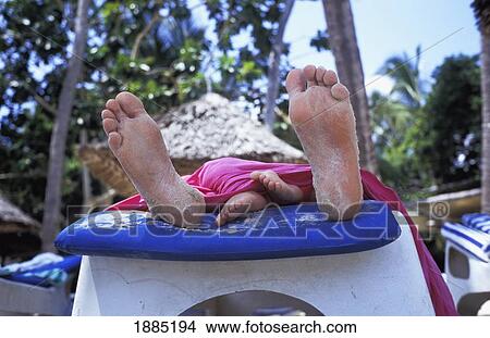 Father And Daughter's Feet On Sun Lounger View Large Photo Image Picture - Father And Daughter's Feet On Sun Lounger. Fotosearch