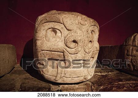 Stock Photo - Feline Stone Head On Display In The Site Museum Of Chavin De Huantar, Ancash, Peru. Fotosearch