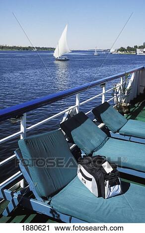 Stock Image - Felucca And Cruise Ship On The Nile. Fotosearch