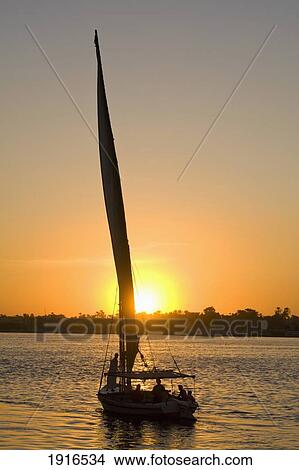 Felucca On River Nile At Dusk View Large Photo Image Picture - Felucca On River Nile At Dusk. Fotosearch