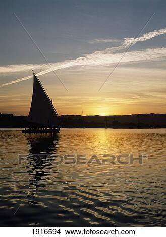 Felucca On River Nile At Dusk View Large Photo Image Picture - Felucca On River Nile At Dusk. Fotosearch