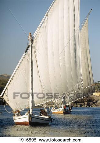 Stock Photography - Feluccas On River Nile At Dusk. Fotosearch
